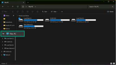 A File Explorer window showing how to access the This PC tab.